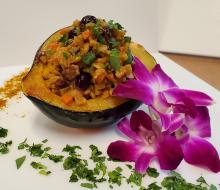 Barley and curried vegetable stuffed acorn squash